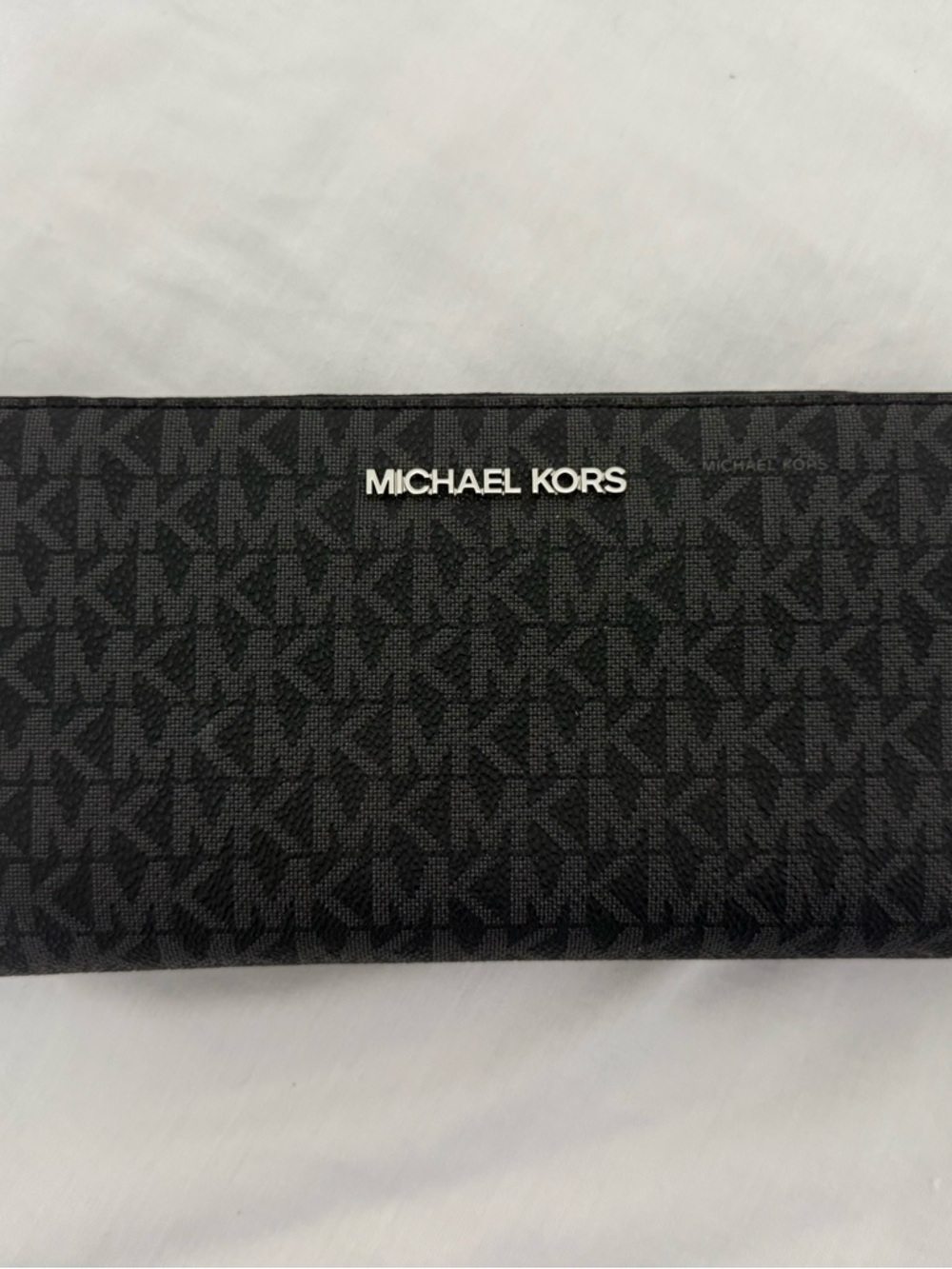 Michael Kors Black MK Logo Zip Wallet with Silver Hardware. NWOT. Never used.